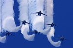 Japan_air_self_defense_force_Kawasaki_T-4_Blue_Impulse_RJAH_Wide_to_Delta_Loop.jpg